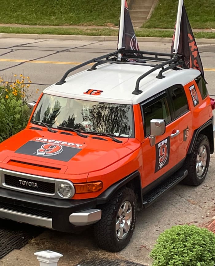 Meyer packs his bright-orange Toyota FJ Cruiser the night before the game, so he can arrive to the Bengals tailgating lot in the early morning hours.